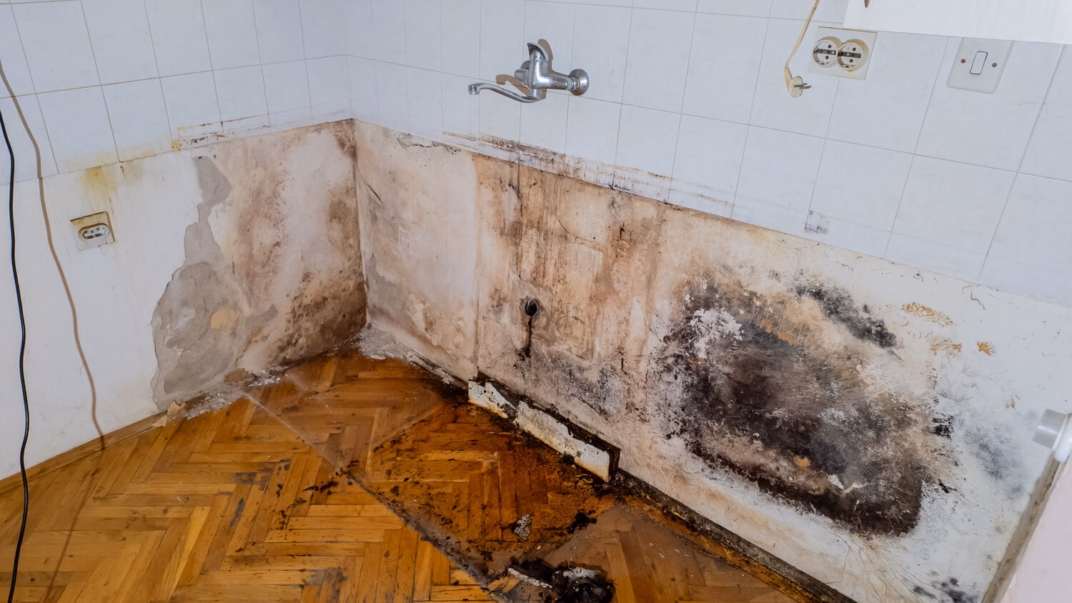 water damage restoration near me ceiling water stain and moisture damage near wall corner in home