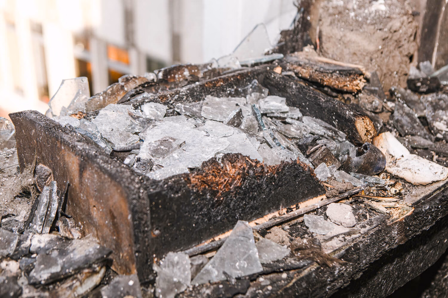 Smoke and fire damaged household contents awaiting cleanup and restoration, illustrating how long does fire damage restoration take following severe property damage.
